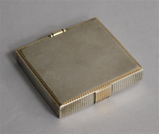 A 1930s Art Deco parcel gilt silver compact/cigarette case, retailed by Asprey, London, gross 283 grams.